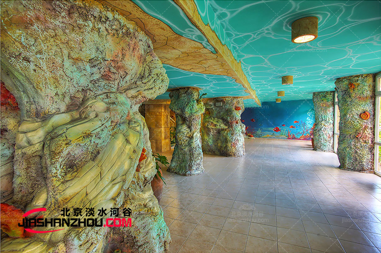 圍繞柱子設(shè)計制作塑石水泥假山是我們的強項